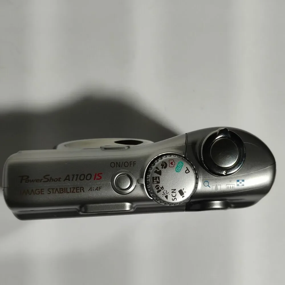 Canon PowerShot A1100IS 12.1 MP Digital Camera With Lowepro Case Tested